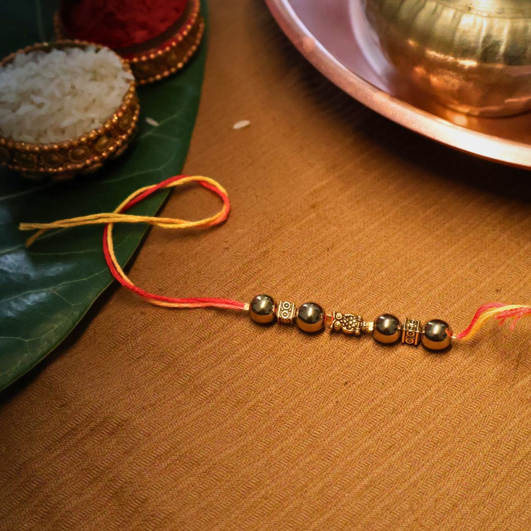 Wealth & Confidence Powered by Golden Pyrite Rakhi