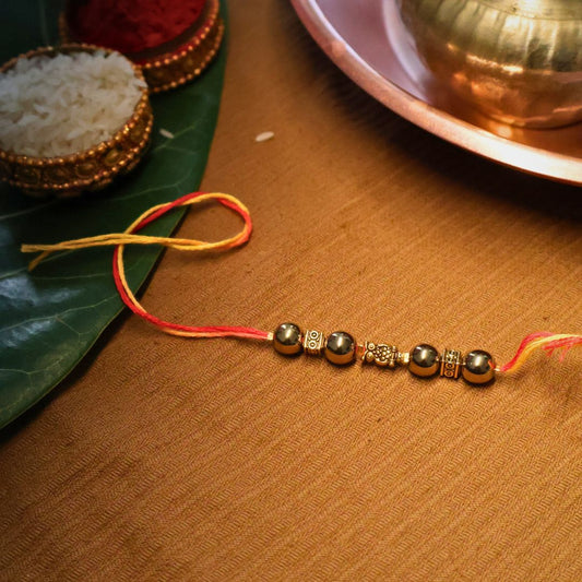 Wealth & Confidence Powered by Golden Pyrite Rakhi